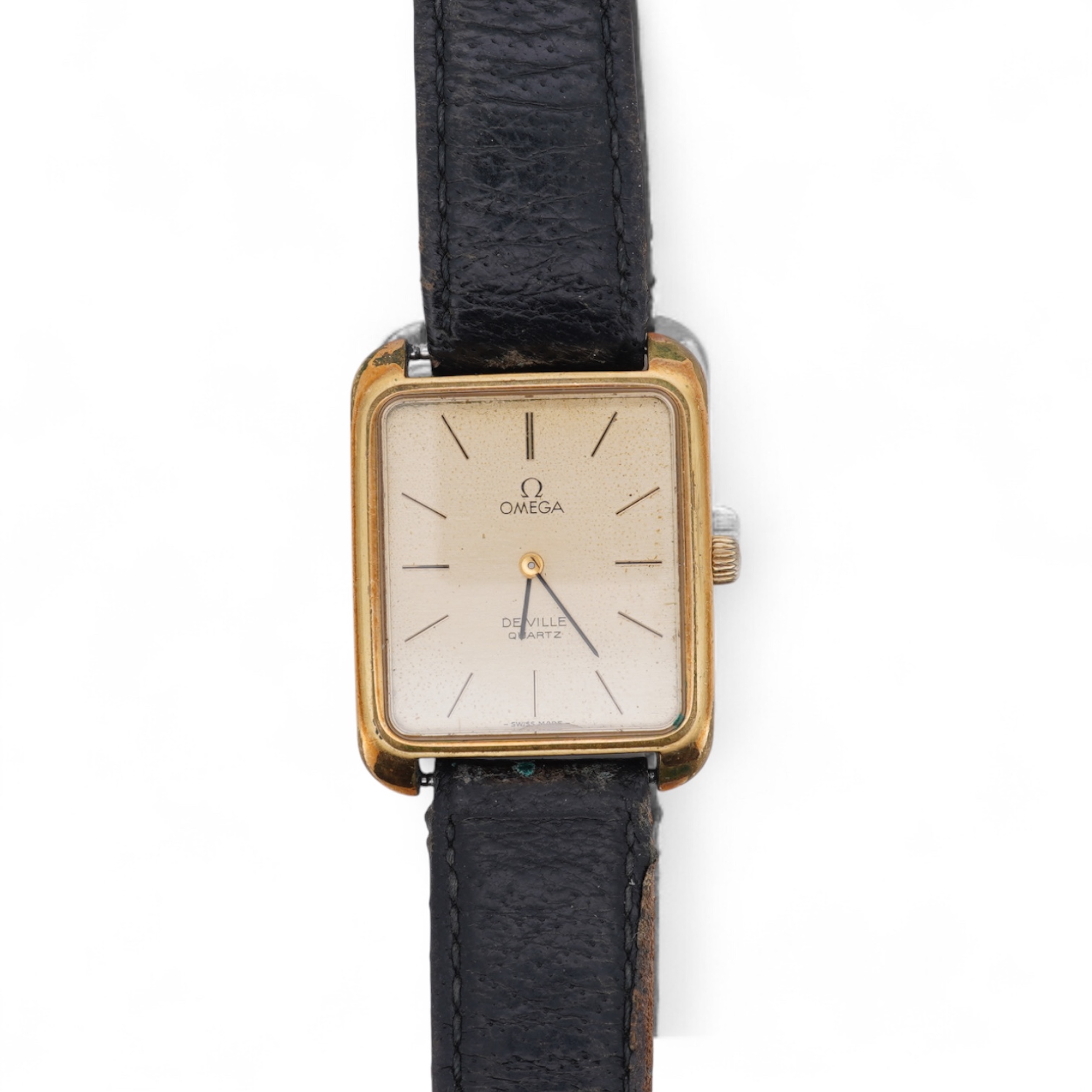 A gentleman's late 1970's steel and gold plated Omega De Ville quartz wrist watch, with rectangular dial and baton numerals, movement c.1330, case diameter 30mm, no buckle, box or papers.